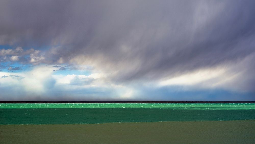 Argentina-Santa Cruz Puerto Santa Cruz-river Santa Cruz under stormy clouds
